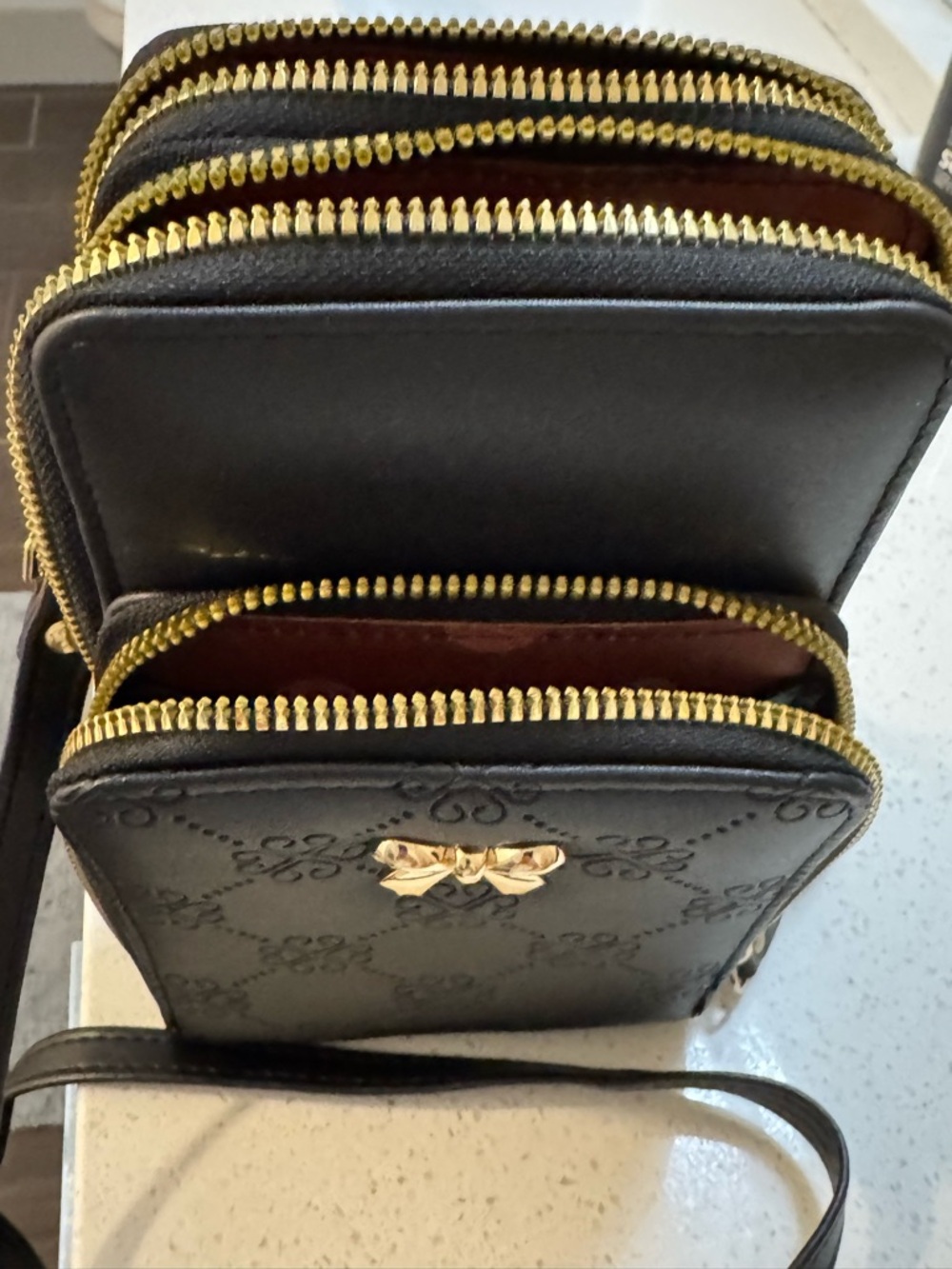 Black Multi-Zip Crossbody Bag with Gold Hardware